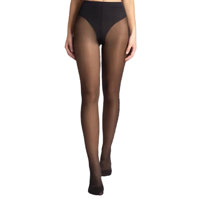 Black luxe 30 tights worn by a model on a white background