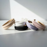 Matte headbands in beige, white, black, light purple, and pink