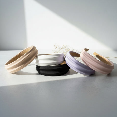 Matte headbands in beige, white, black, light purple, and pink
