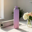 Lilac to pink matte 1L water flask on white marble with roses