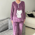 Mauve fleece pyjama set with a white crown cat applique and white piped button neck