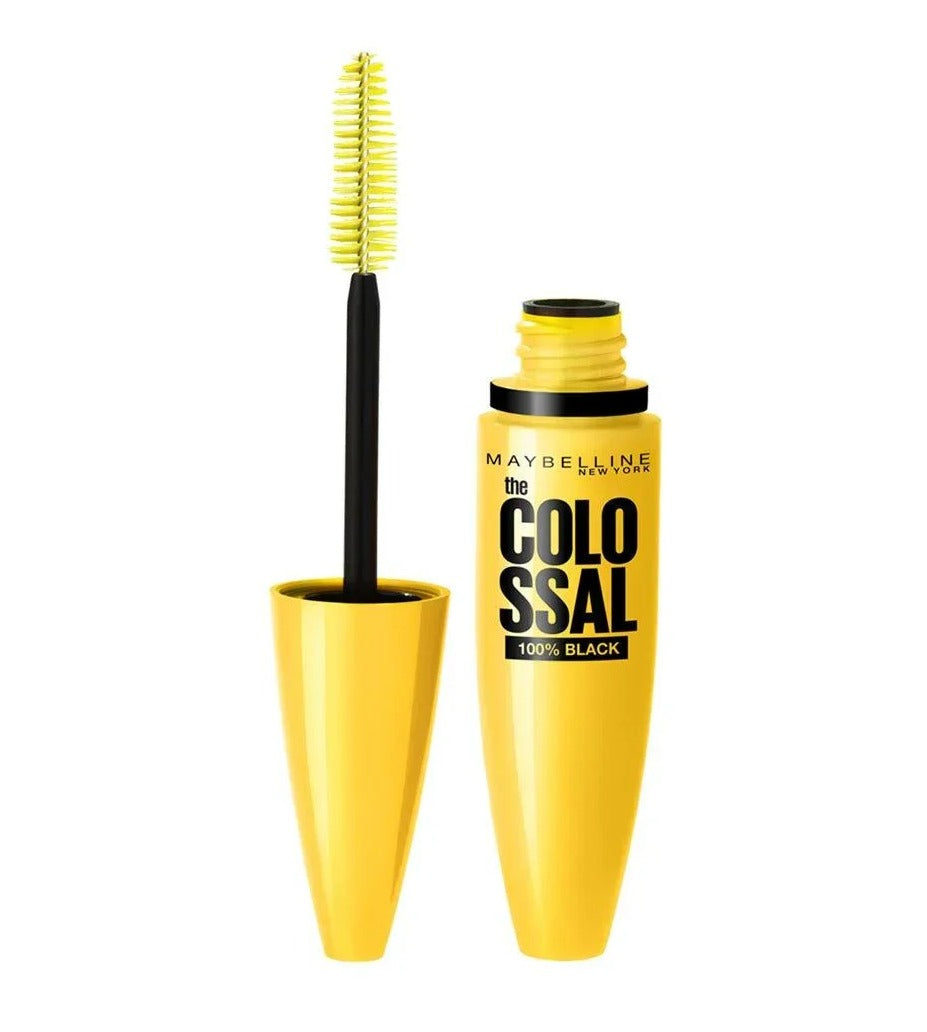 Yellow Maybelline The Colossal mascara tube next to its open cap and yellow bristle wand