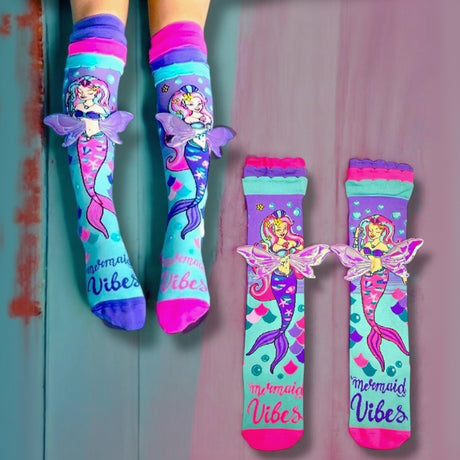 Knee high mermaid socks with scale print and Mermaid Vibes text shown worn and flat