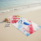 Red haired mermaid towel with a royal blue scaled tail shown at the waterline