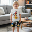 White boys set with a Mickey, Minnie, Goofy and Pluto tee and black all over character shorts