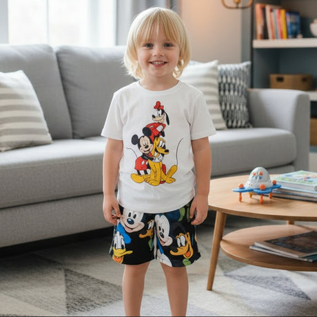 White boys set with a Mickey, Minnie, Goofy and Pluto tee and black all over character shorts