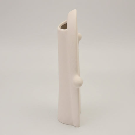 Side view of the oval vase showing how thin the slab is and its angled top opening