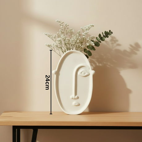 Bright white oval vase with a single line face, holding gypsophila and eucalyptus, marked 24cm
