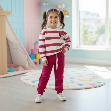Girls pink and cream striped Minnie Mouse sweatshirt with pink joggers set worn indoors