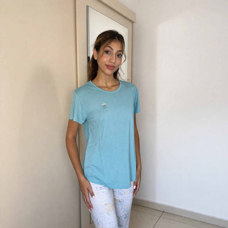 Aqua short sleeve pyjama top with a small embroidered crest at the chest
