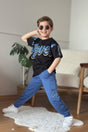 Boys set with a black Move slogan tee and blue cargo joggers, worn with white sneakers
