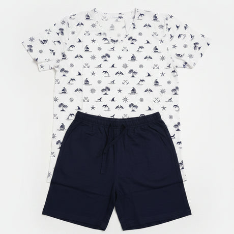 White sailboat and anchor print tee with navy shorts laid flat