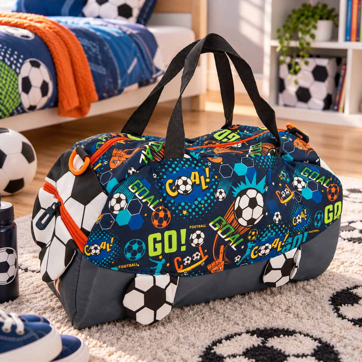 Navy football print duffle bag with GOAL graphics and football ends in a boys bedroom