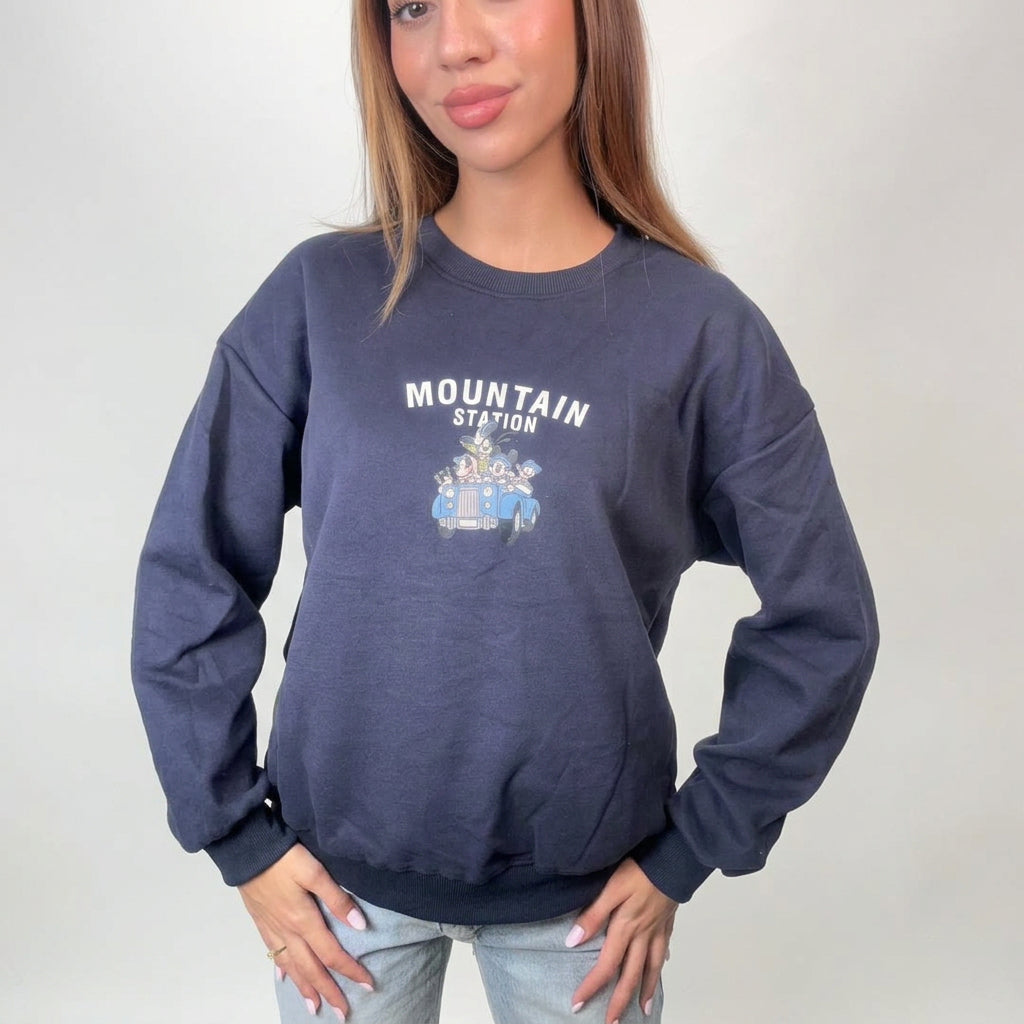 Close up of the white lettering and blue vintage car print on a navy sweatshirt