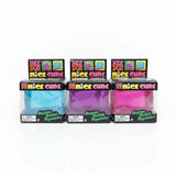 Three NeeDoh Nice Cube boxes side by side holding blue, purple and pink squish cubes
