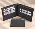 Charcoal grey nubuck bifold with its card holder, cards stacked in both panels