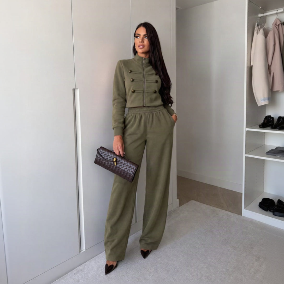 Olive military style cropped zip jacket and matching wide leg pants worn with black heels