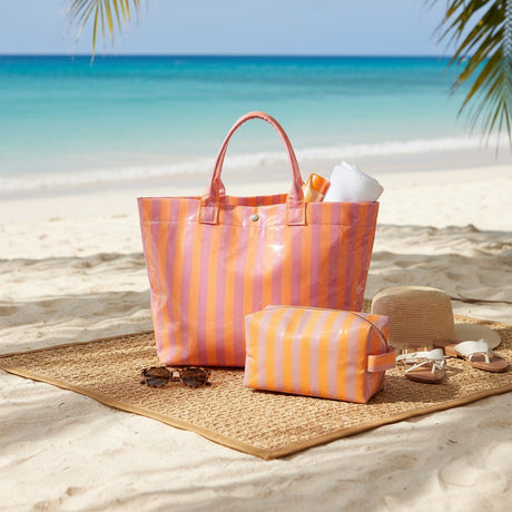 Orange striped beach tote and matching pouch set on the sand – Jack Gifts Online Lebanon