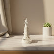 Our Lady of Lebanon tower statue set in a wide dish base with a ring shaped candle well