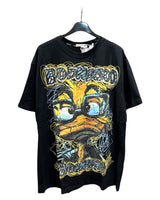 Black oversized tshirt with a colorful duck graphic print on the front