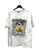 An oversized white tshirt with a graphic of a dog character and the text 'GOOD TIMES'