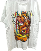 White oversized tshirt with a colorful graphic print of Jerry sitting on cheese
