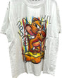 White oversized tshirt with a colorful graphic print of Jerry sitting on cheese