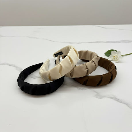 Padded headbands in black, white, beige and brown