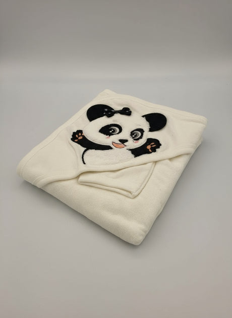 Cream fleece hooded baby towel folded with a black and white panda applique on the hood