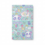 A pastel blue 'Panda Colouring Book Set' with cute cartoon panda illustrations, rainbows, stars, and hearts, resting on a brown wooden surface.
