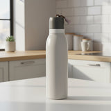 Tall slim thermal bottle shown on a kitchen counter