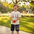 Boy wearing a cream Paw Patrol tee with navy shorts, Jack Gifts Online Lebanon