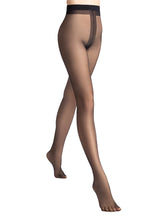 Black sheer tights with a lighter gusset panel, stepping forward