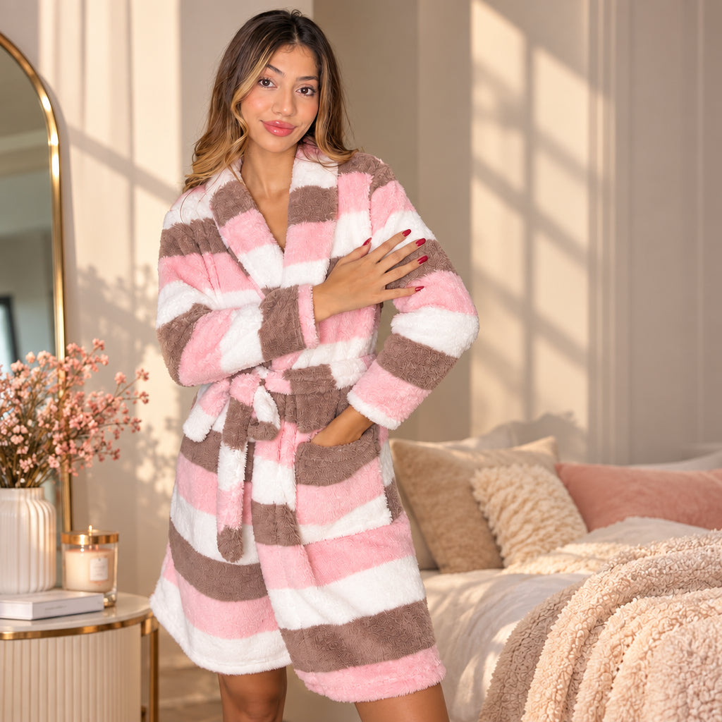 Pink, cream and cocoa striped fleece robe worn belted, hand resting on the chest