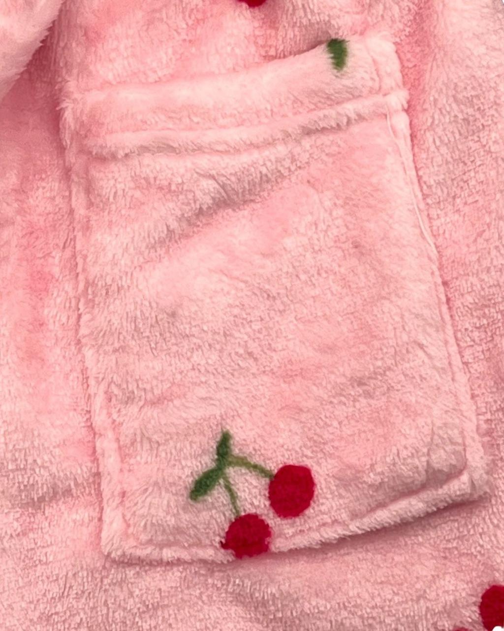 Front patch pocket and cherry embroidery detail on the pink fleece robe