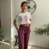 Pink drink print crop tee styled with burgundy drawstring trousers