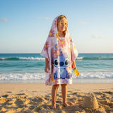 Girl wearing a pink floral Stitch hooded poncho towel – Jack Gifts Online Lebanon