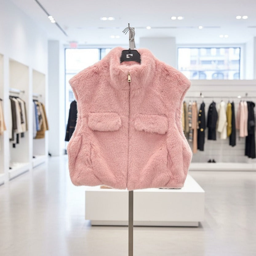 Pink faux fur vest front view showing fluffy texture and open fit