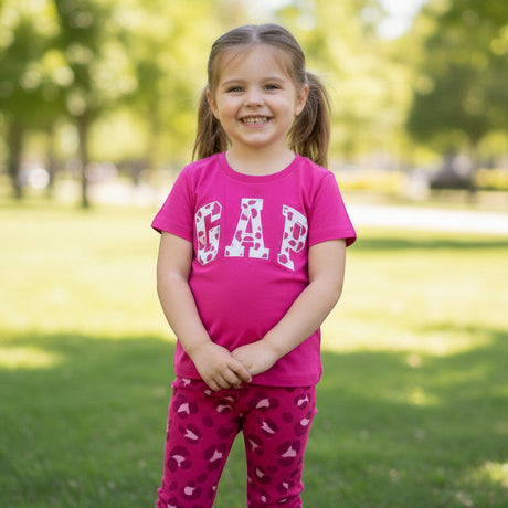 Hot pink girls set with a white logo print tee and pink leopard print leggings