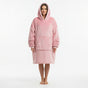Bright rose pink in a long shaggy pile, hood raised and self lined in the same shade, on white