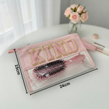 Pink with 'KIND' text on a white surface with measurements 15x24cm