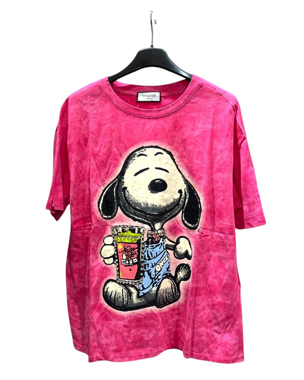 Pink tshirt with cartoon dog character design jolding a cup on a hanger