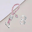 Pale pink crystal rope keychain with a rose teardrop drop and silver swivel clasp