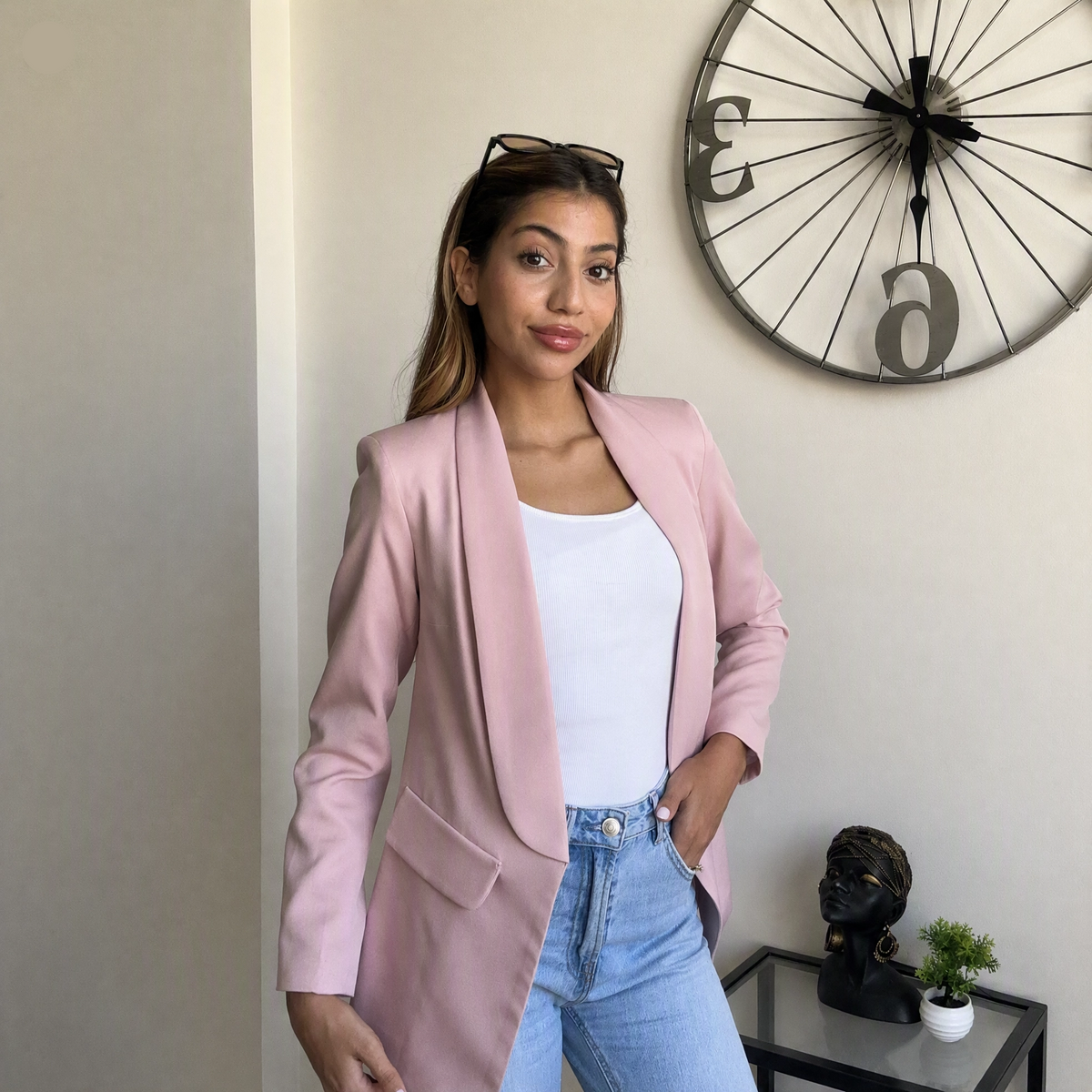 Casual pink jacket styled for everyday wear, one hand in the pocket