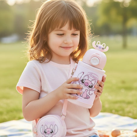 Blush pink flip top tumbler with a 3D Angel lid topper and a matching round coin pouch