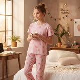 Girl in a pink strawberry print pajama set holding a mug, Jack Gifts Online Lebanon