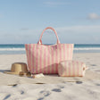 Pink striped beach tote and matching pouch set on the sand – Jack Gifts Online Lebanon