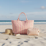 Pink striped beach tote and matching pouch set on the sand – Jack Gifts Online Lebanon