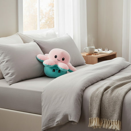 Pink and teal two sided octopus plush toy