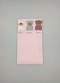 Soft baby pink blanket folded flat, cream, grey and dusty rose bear appliques with cursive embroidery